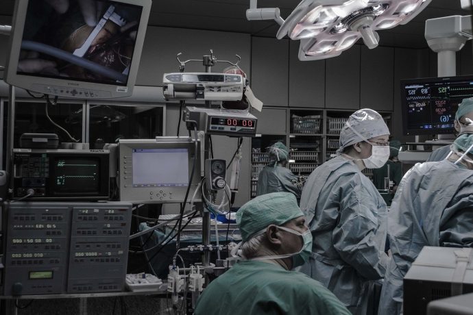 person-people-wearing-surgical-clothes-inside-operating-room-human-human